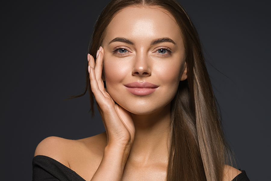 Female Face Beauty Woman Long Hair Fly Natural Make Up Clean Healthy Skin Hand Touching Face