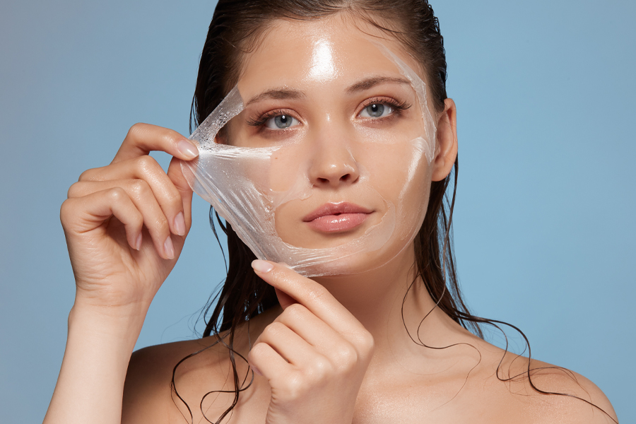 Attractive Woman Removing Moisturizing Mask