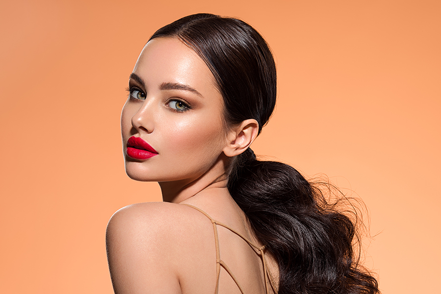 Closeup Face Of Young Beautiful Woman With A Healthy Clean Skin