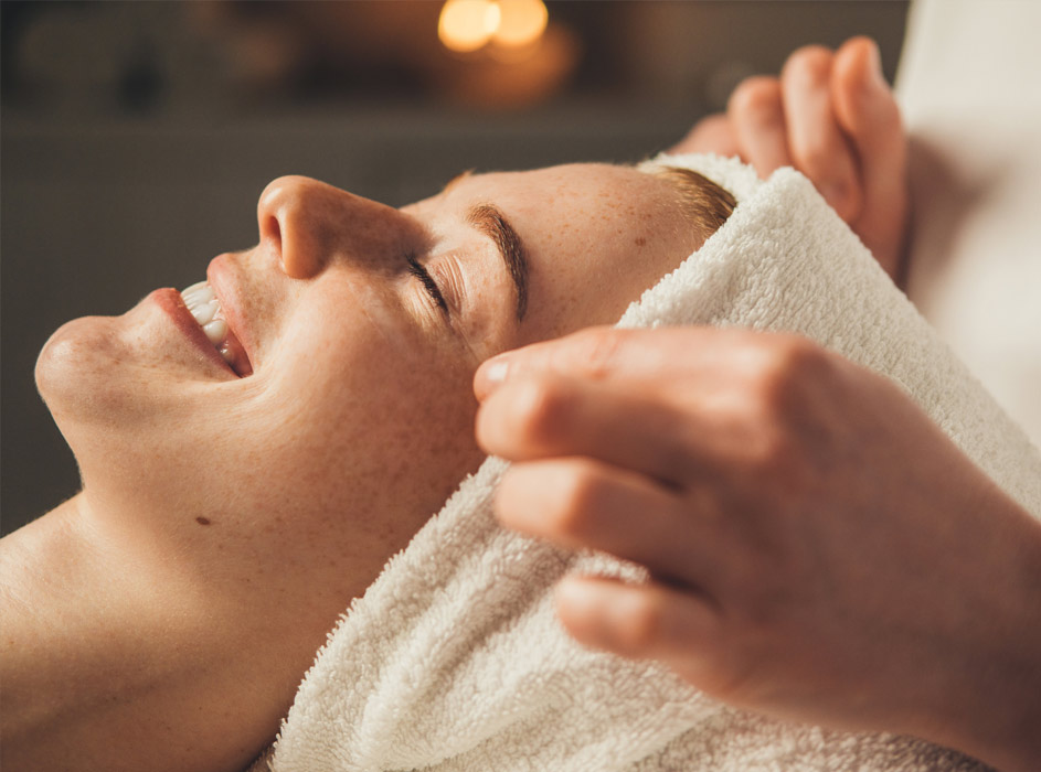 Spa Services 4 Close-Up Portrait Of A Woman Getting Face Massage In Spa Salon. Doctor Hands. Pretty Female Patient. Beauty Treatment. Healthy Skin Procedure. Young Woman Head