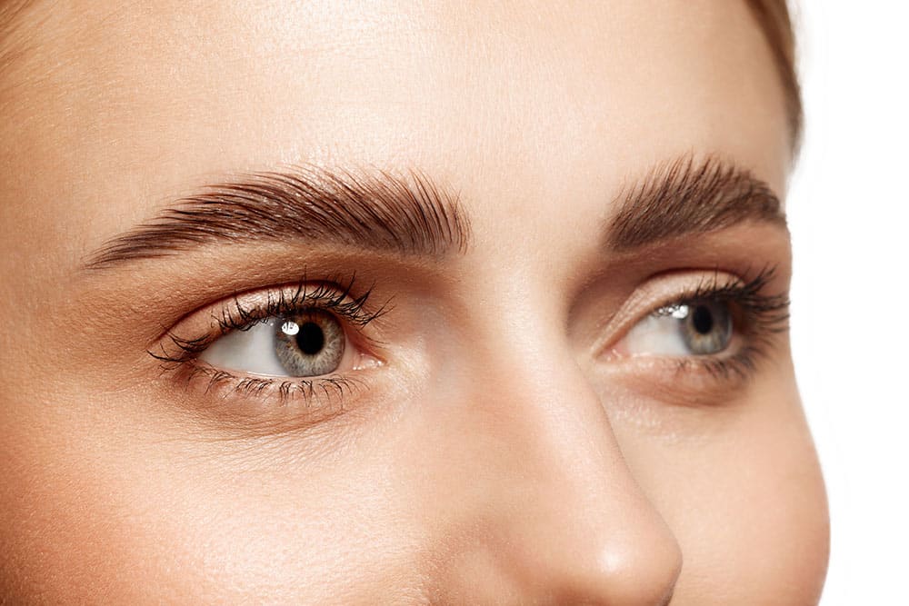 Close-Up Of A Woman'S Face Showcasing Her Eyes, Eyelashes
