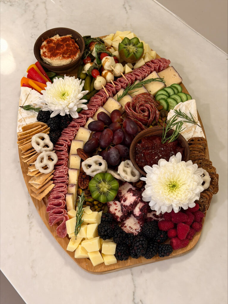 Spa Parties 2 Colorful Charcuterie Board With Flowers At Spa Parties.
